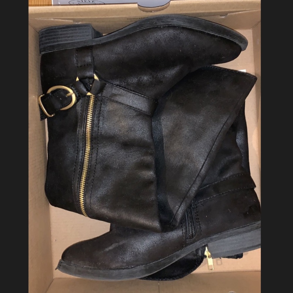 Black riding boots with good detail
